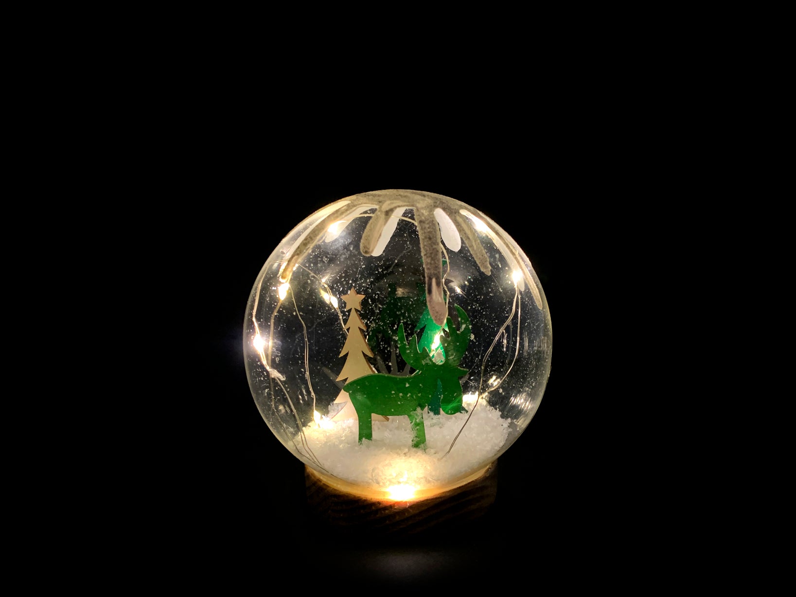 Sfera in vetro Natale con led  su base legno h 13