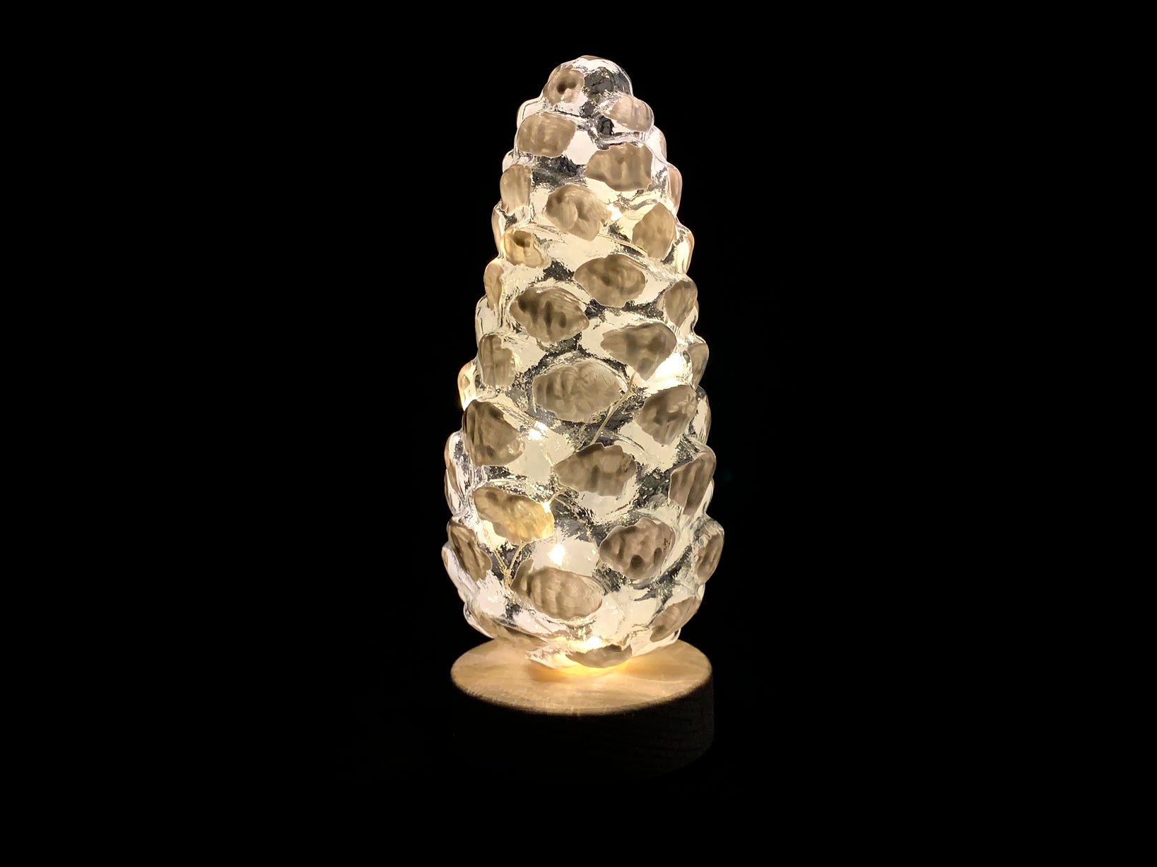 Pigna in vetro Natale con led su base legno h 21
