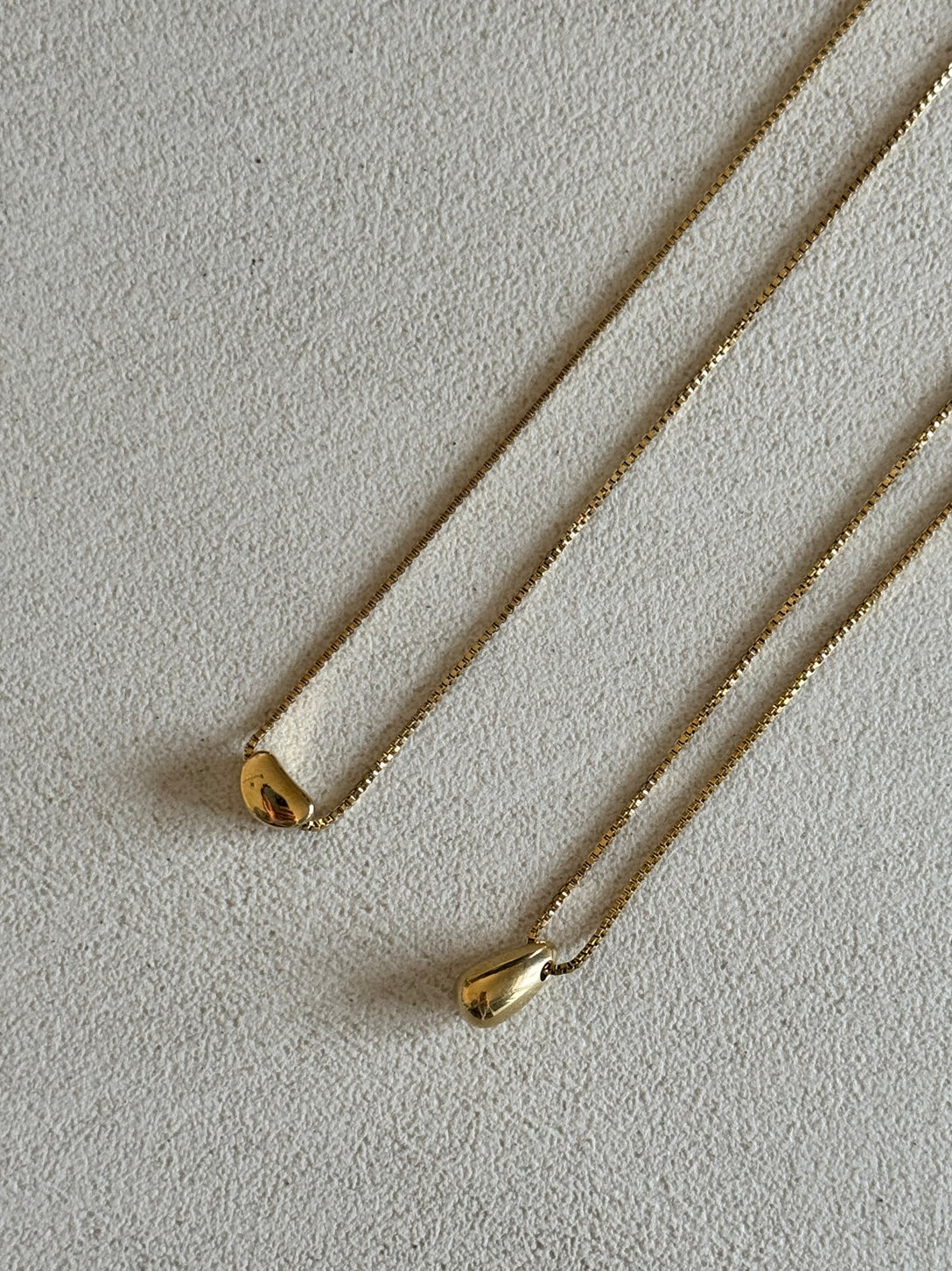 Collana saliscendi