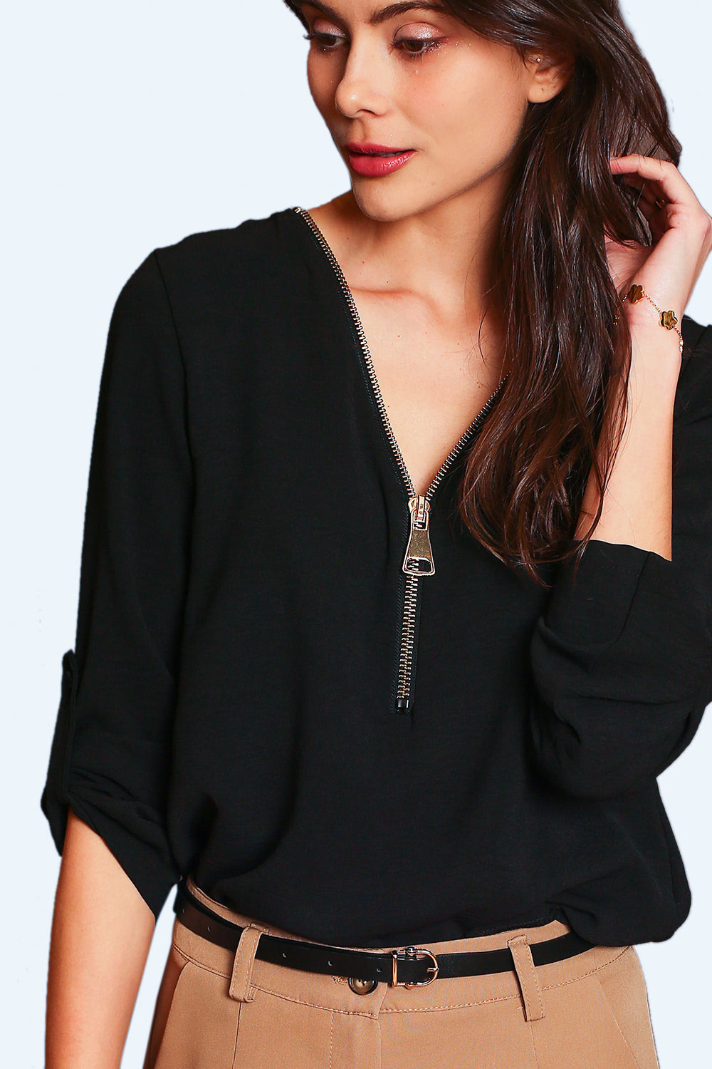 Maglia con scollo a V e maniche con cerniera a 3/4 NERO