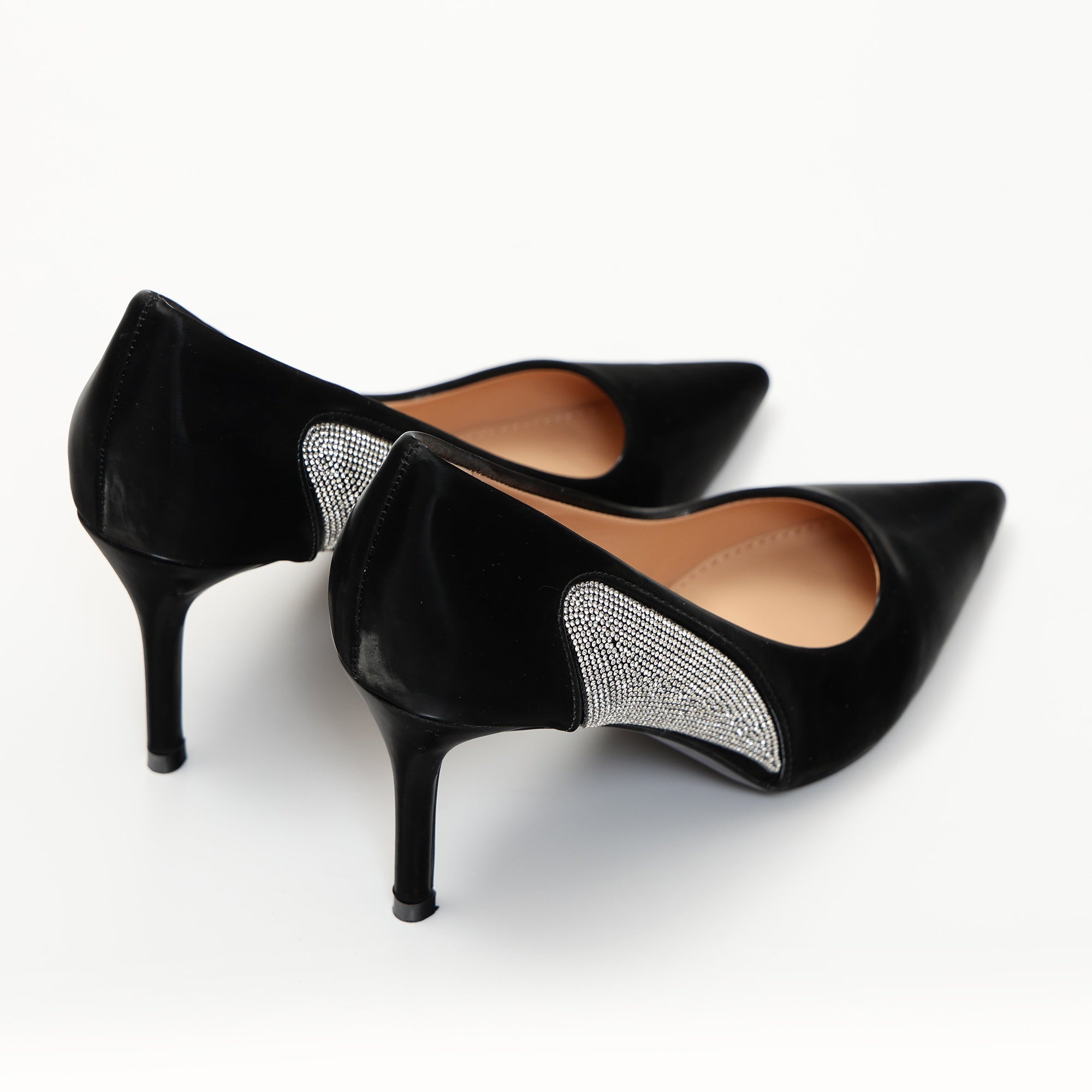 Dècolletè pumps in simil pelle verniciata con strass laterali Nero