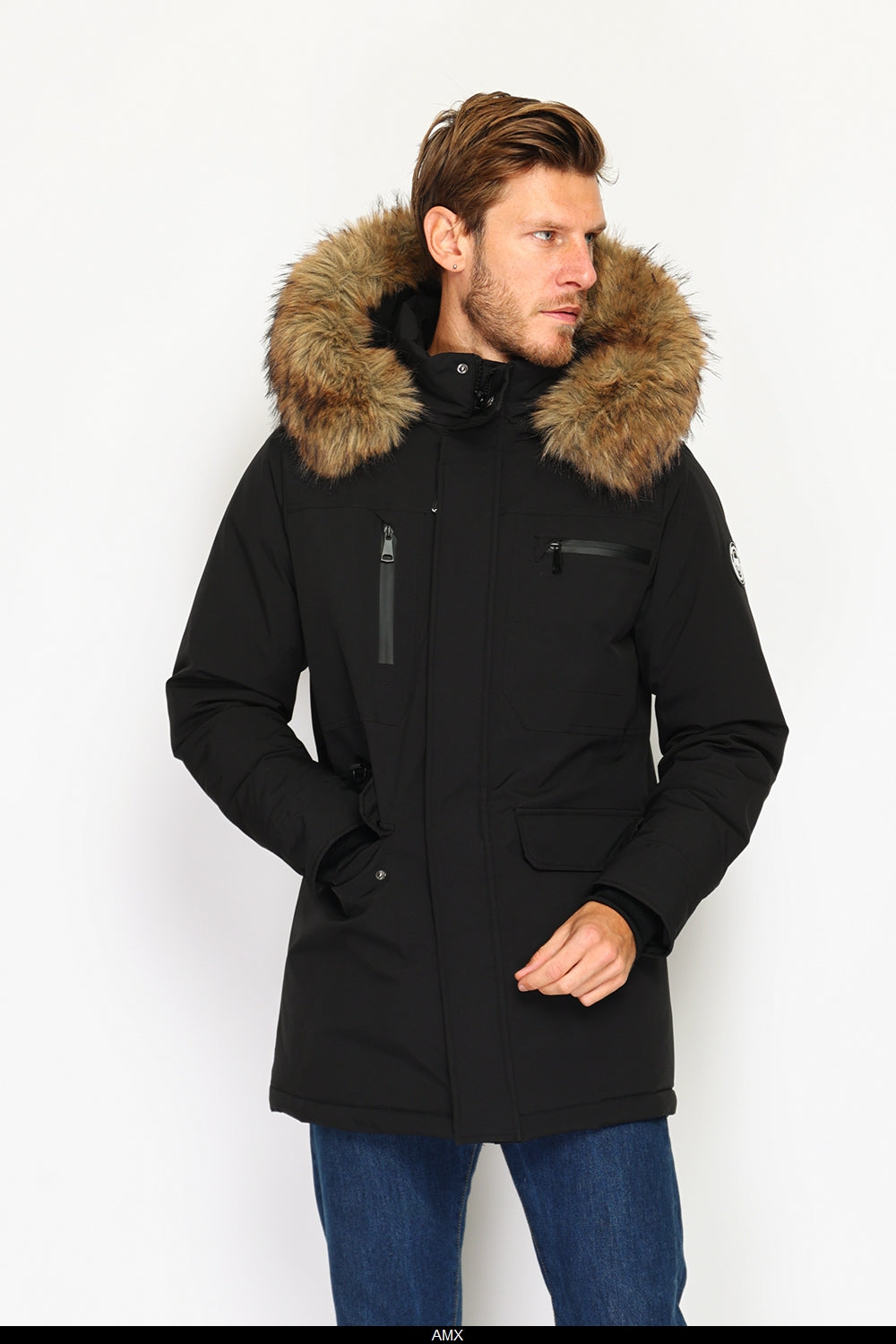 Piumino impermeabile con isolamento termico fino a -20°C, con cappuccio staccabile bordato di pelliccia, tasche multiple, maniche lunghe con polsini elasticizzati. - Nero