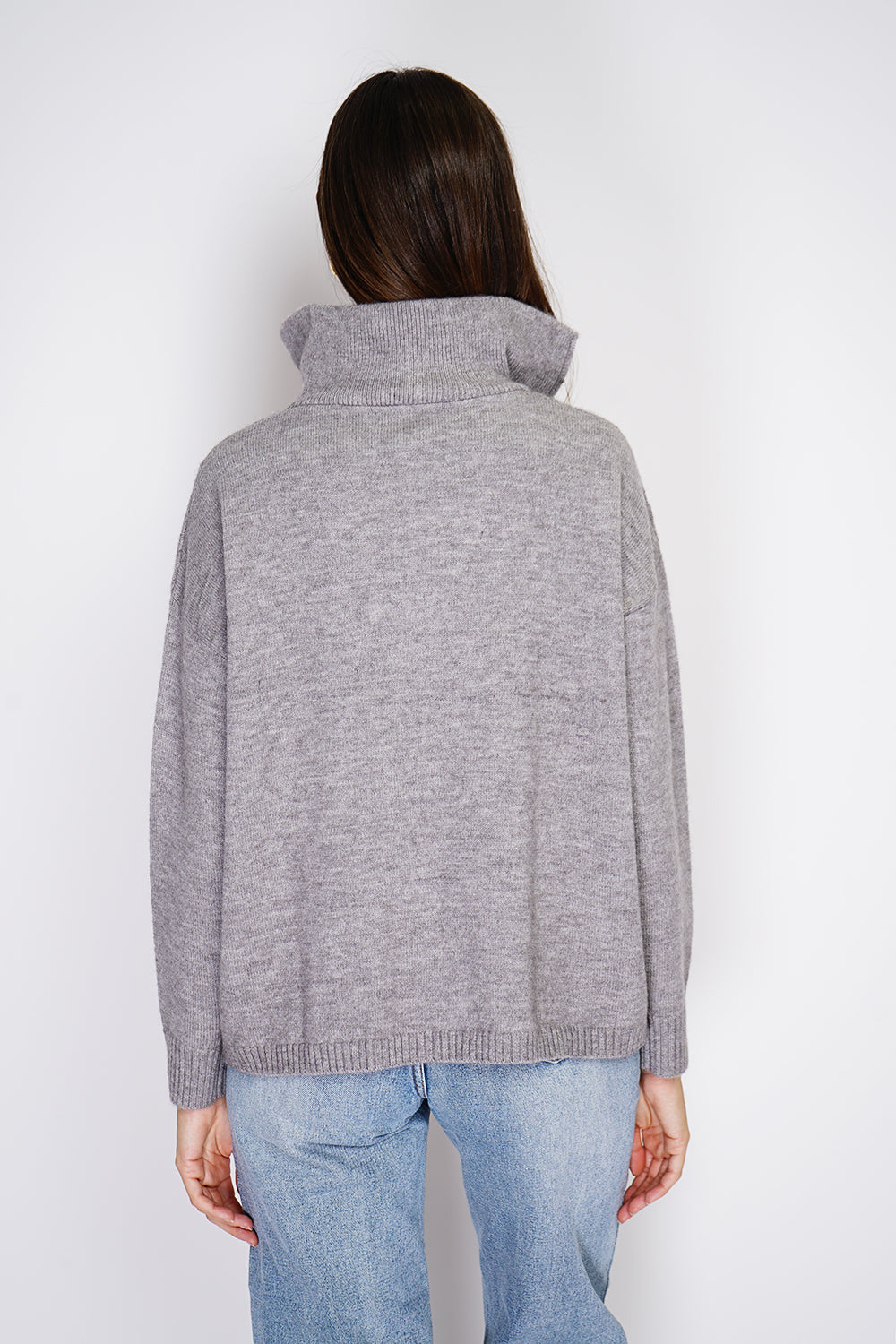 Maglione poncho con collo alto e chiusura a zip, lavorazione a maglia fantasia con maniche lunghe Flanella