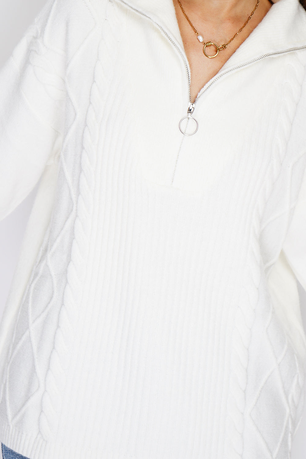 Maglione poncho con collo alto e chiusura a zip, lavorazione a maglia fantasia con maniche lunghe Naturale