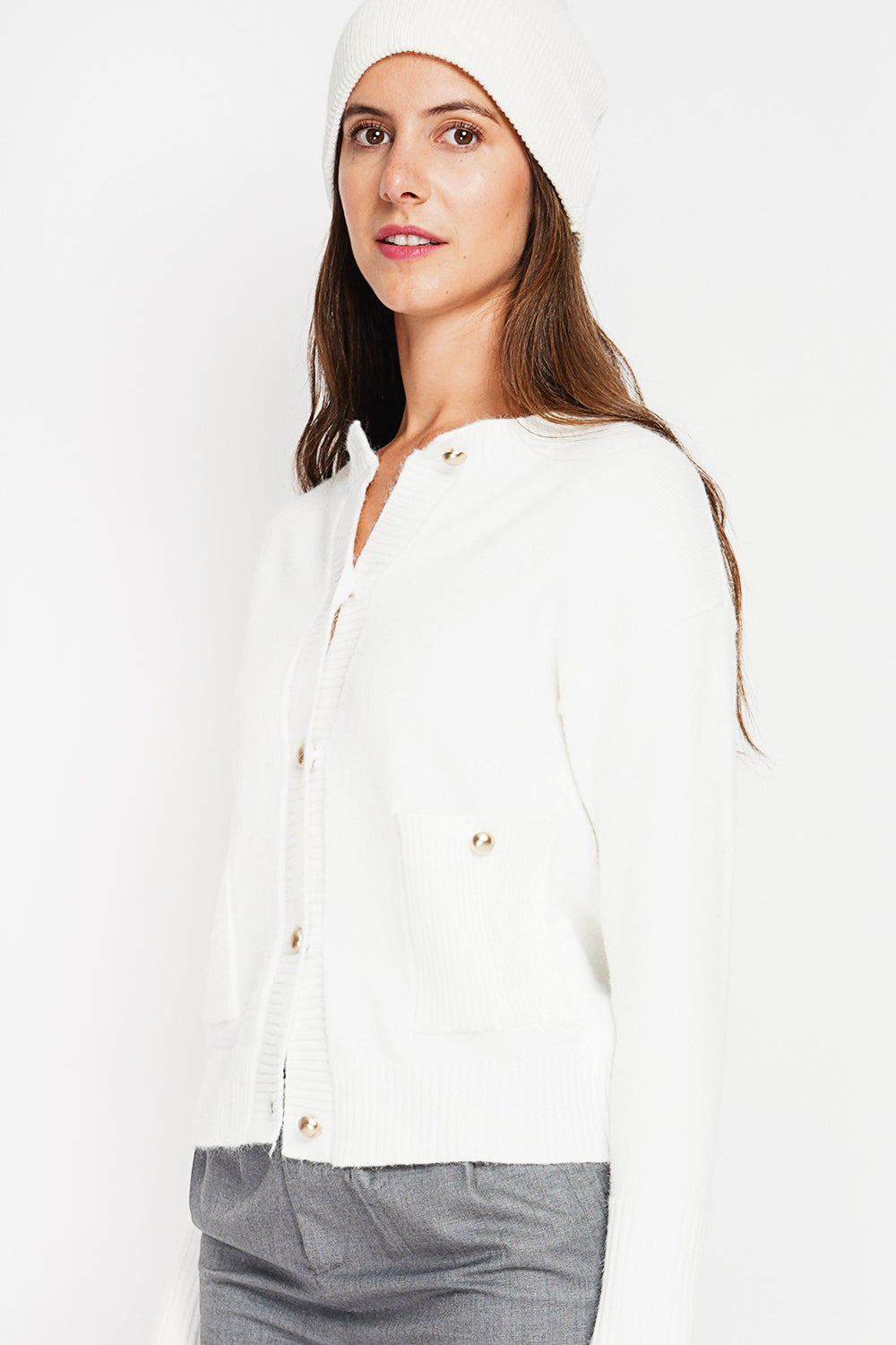 Gilet girocollo con tasche anteriori abbottonate e maniche lunghe Naturale