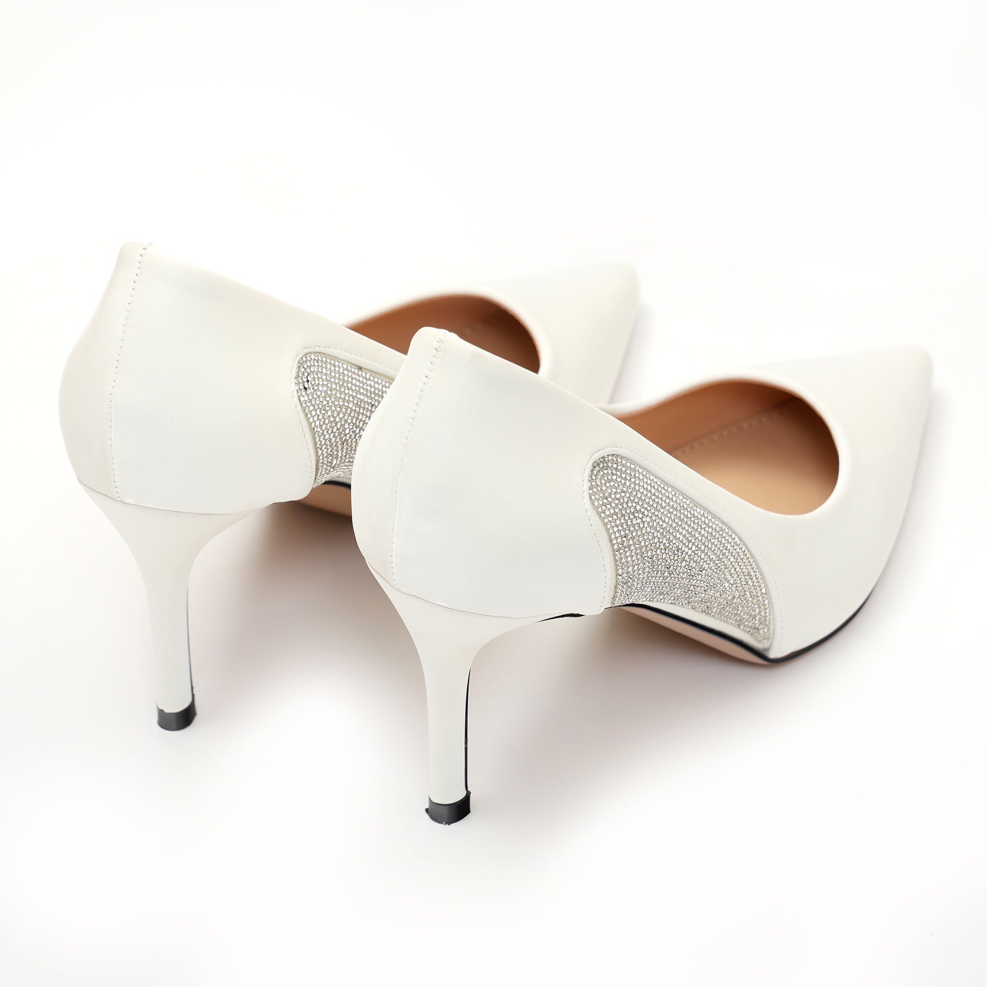 Dècolletè pumps in simil pelle verniciata con strass laterali Bianco