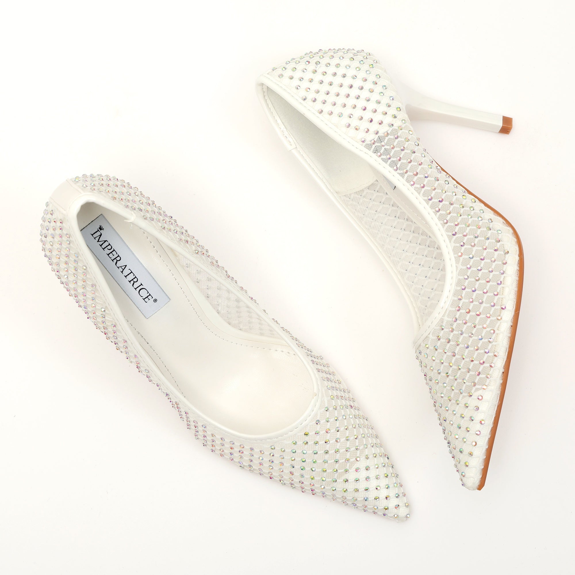 Dècolletè pumps in simil pelle con tomaia bucherellata ricoperta di strass Bianco